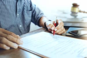 Injured at work in Reno? You face a tough choice with Nevada workers’ comp settlements. Specifically, stipulated settlements and compromise and release settlements offer distinct