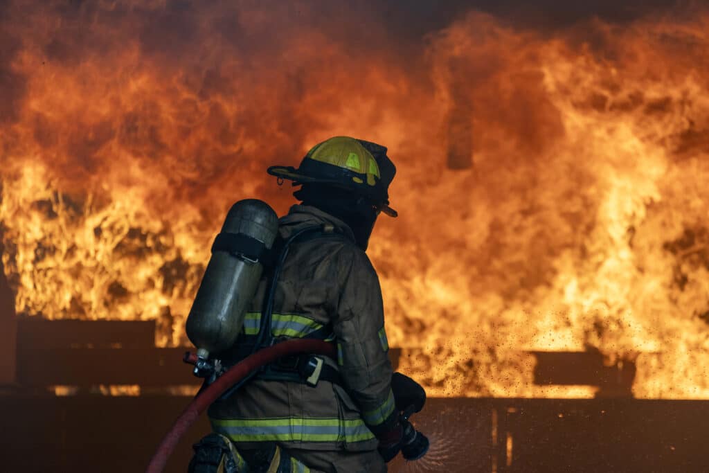 Firefighting is physically demanding work under even normal circumstances. Firefighters routinely carry heavy protective equipment, hoses, breathing apparatus, tools, and other gear while responding to emergencies. When staffing levels, response areas, or department operations change, those physical demands can become even greater.